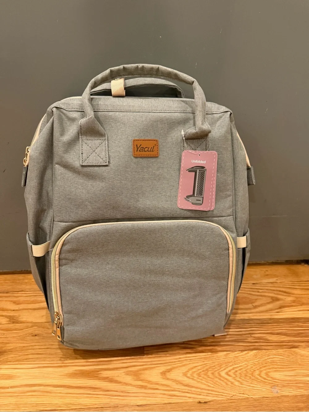 Diaper Bag Backpack that unfolds into a bassinet. NWT!